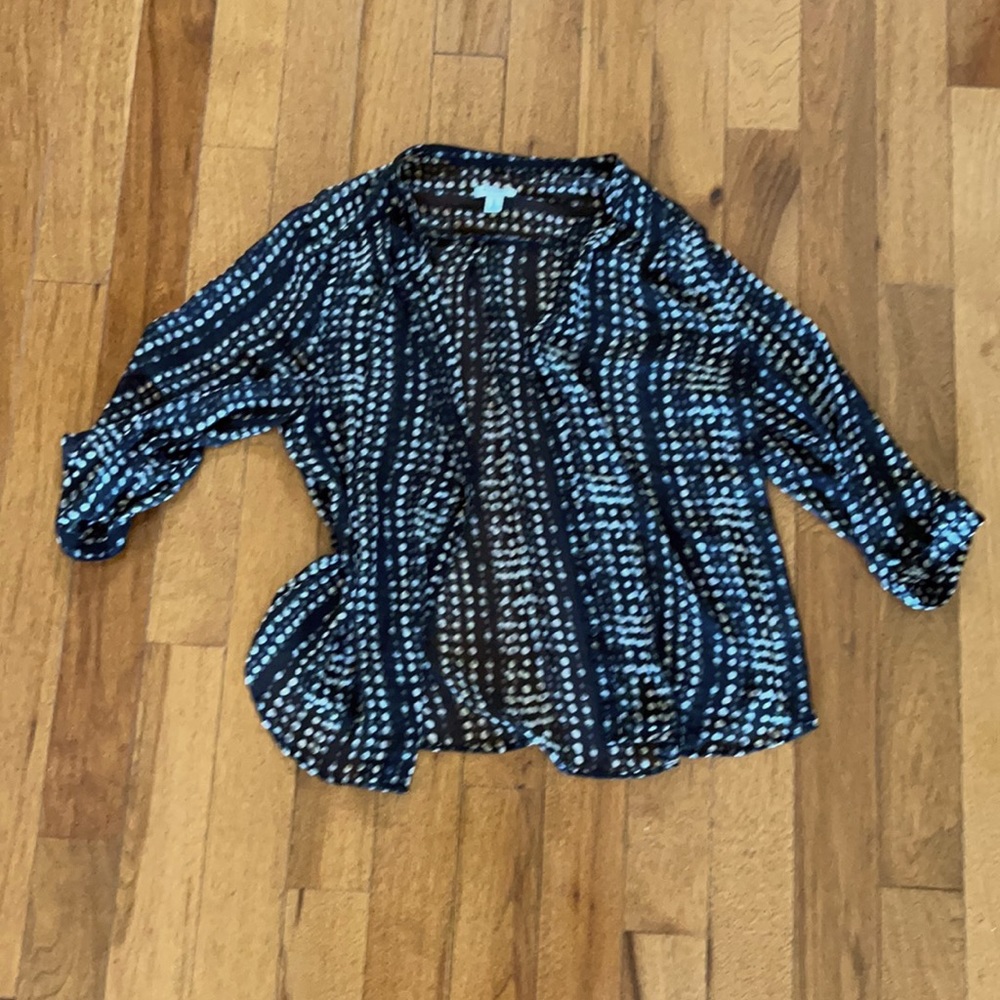 Button down tunic style shirt.